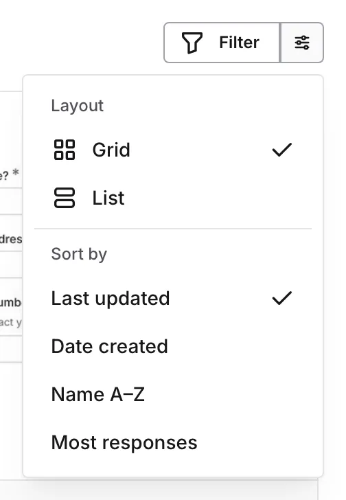 The icon-only Display menu open with layout and sort options